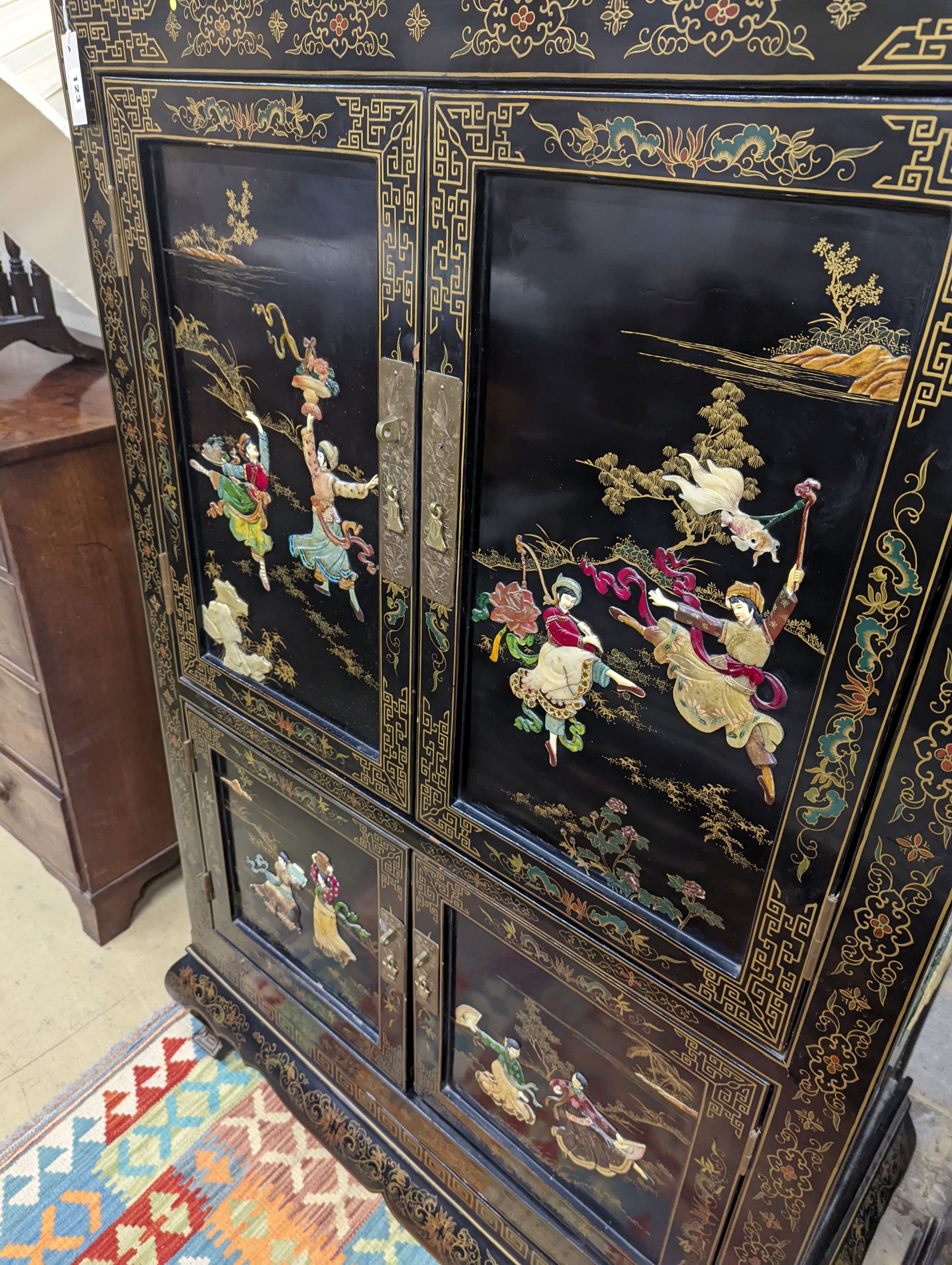 A Chinese hardstone mounted black lacquered four door side cabinet, width 92cm, depth 51cm, height 152cm